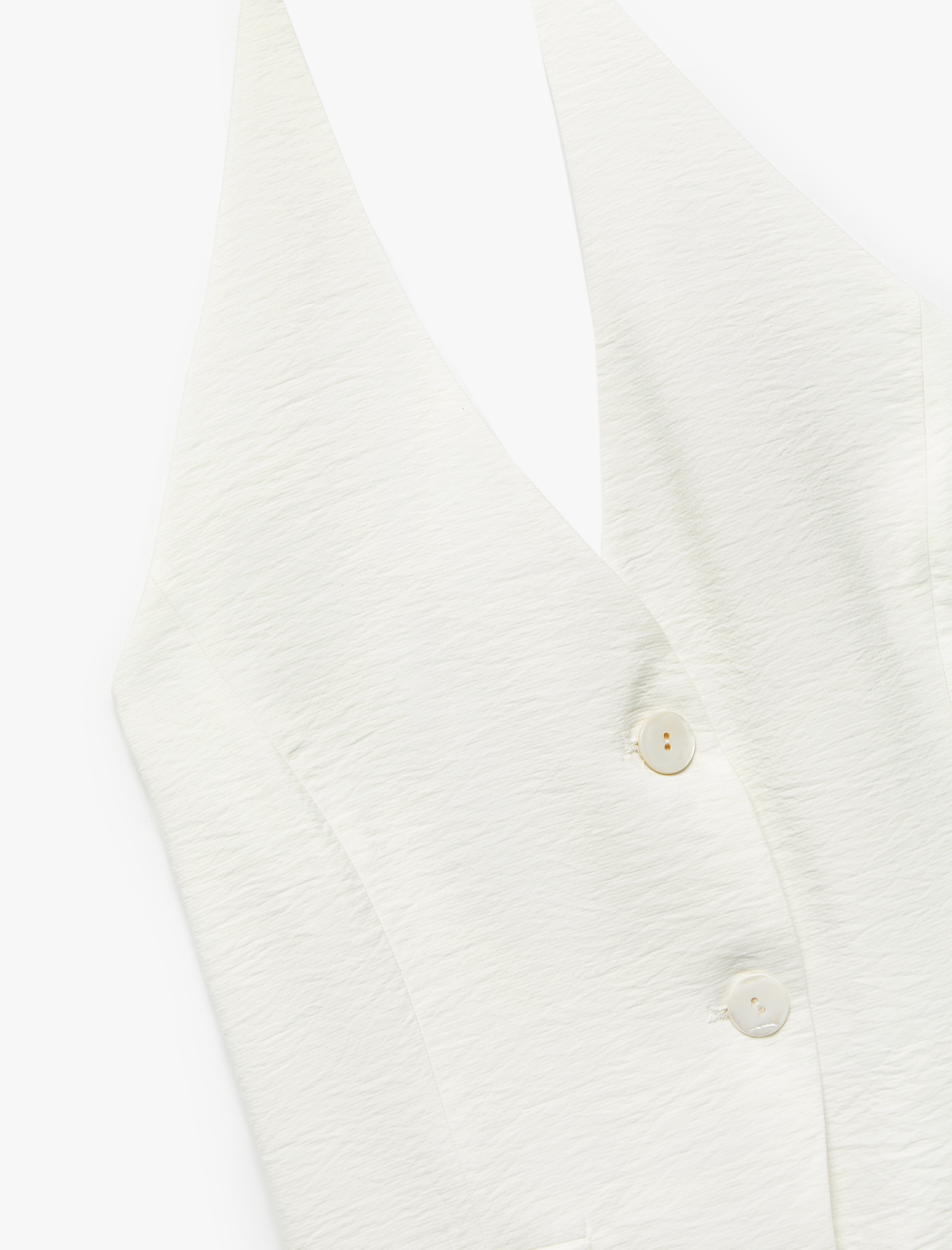   Koton X Sibil Çetinkaya -  Arkadan Bağlama Detaylı Sırt Dekolteli Halter Yaka Yelek