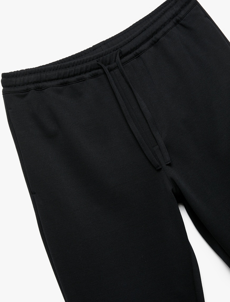   Straight Fit Pike Kumaş Cep Detaylı Beli Bağcıklı Eşofman Görünümlü Pantolon