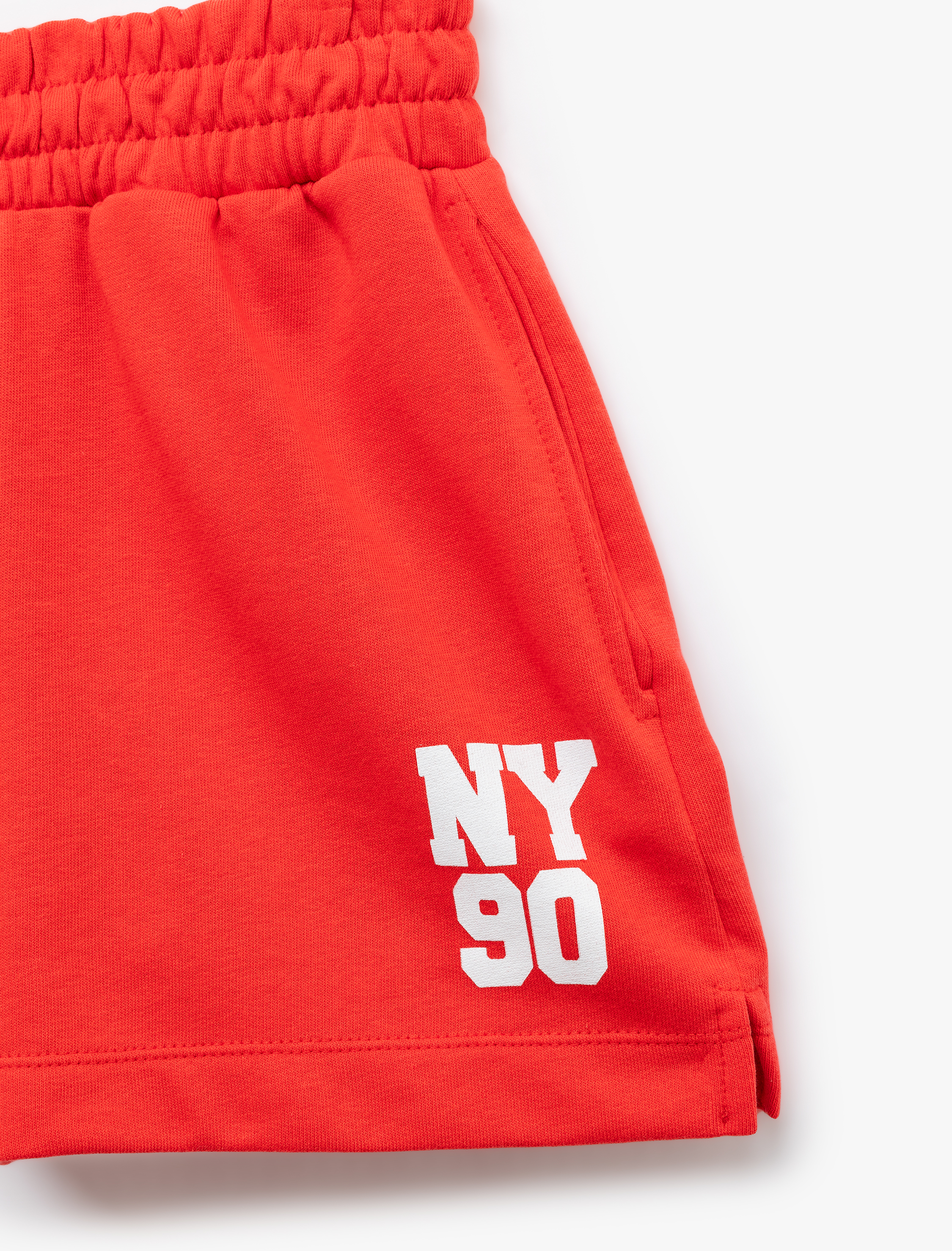   Beli Lastikli Baskılı Cepli Rahat Kalıp Mini Spor Şort