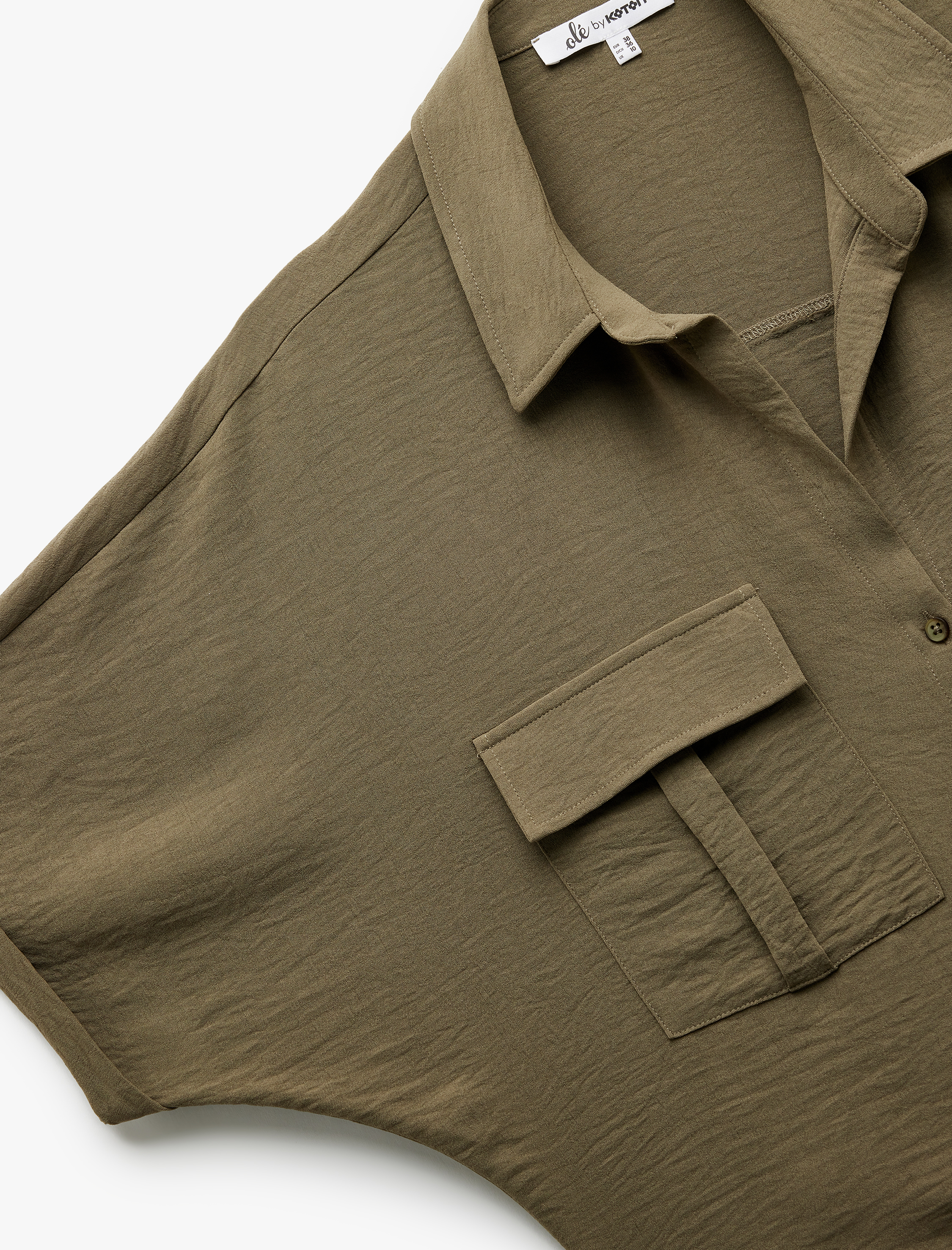   Kısa Kollu Klasik Yaka Bağlama Detaylı Cepli Crop Oversize Bluz