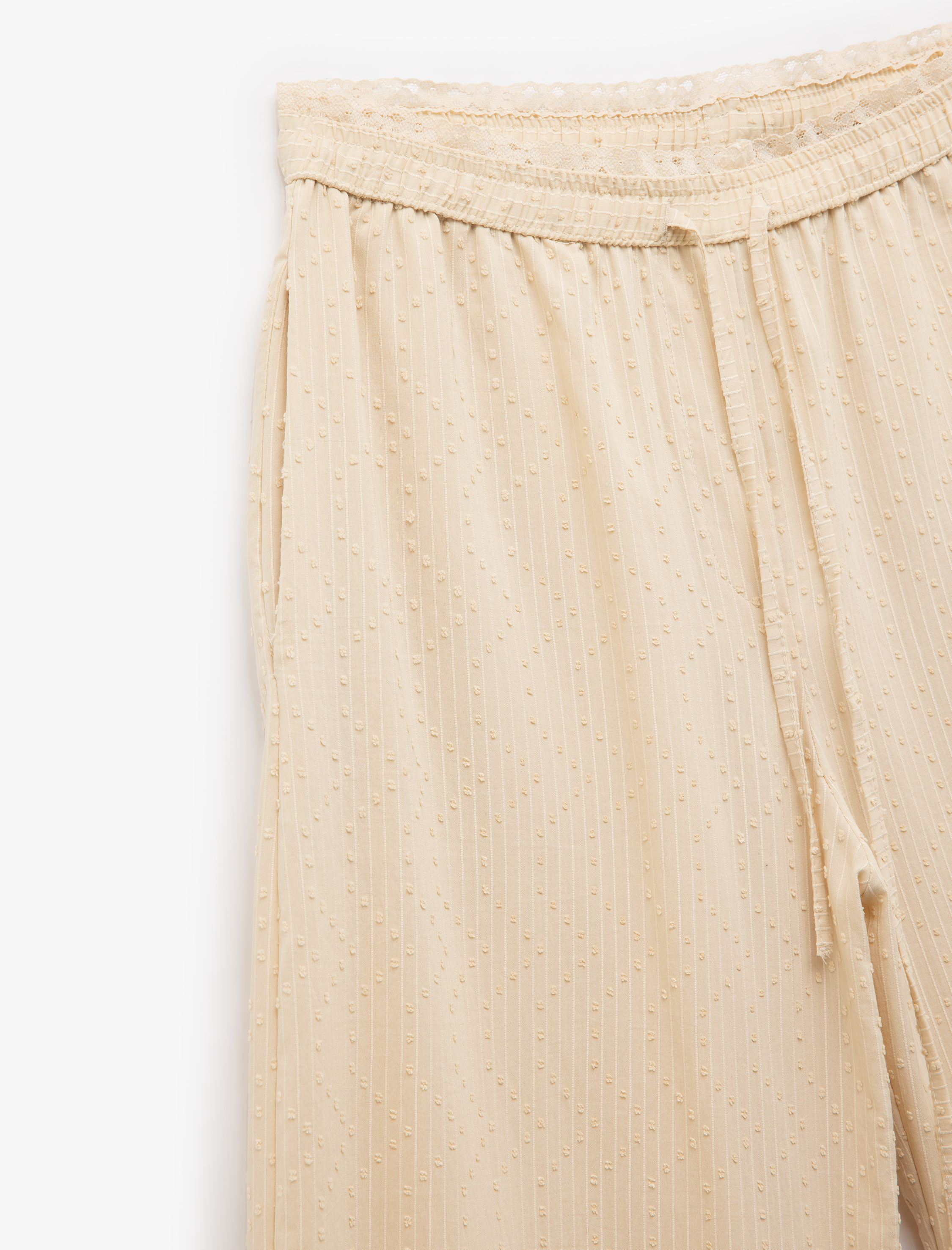   Beli Lastikli Dokulu Cepli Geniş Paça Pantolon