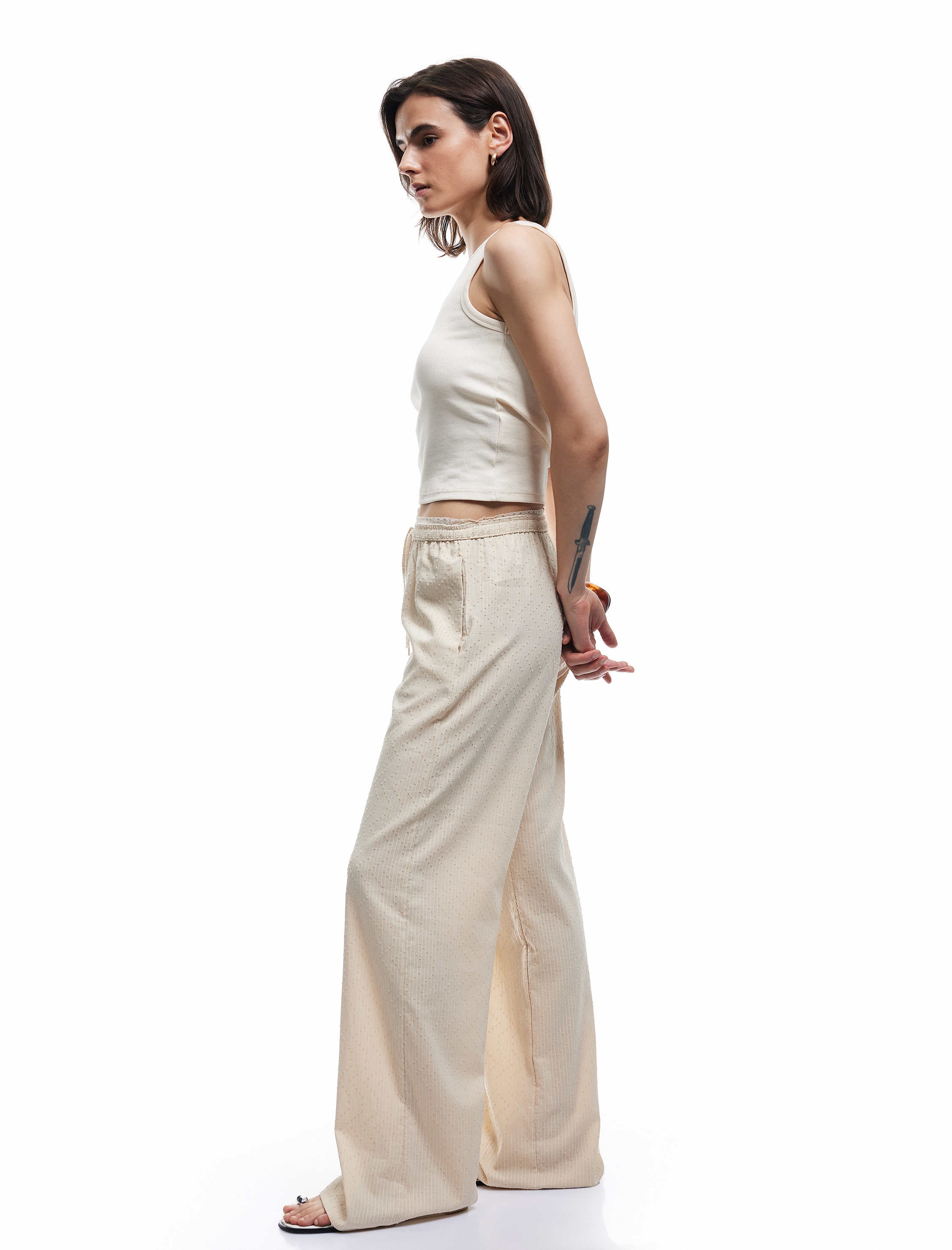   Beli Lastikli Dokulu Cepli Geniş Paça Pantolon