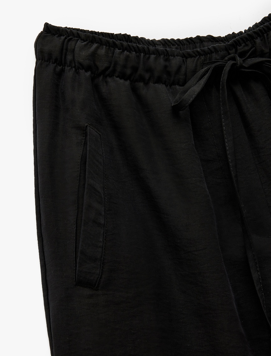   Beli Bağcıklı Bol Kalıp Cepli Geniş Paça Pantolon