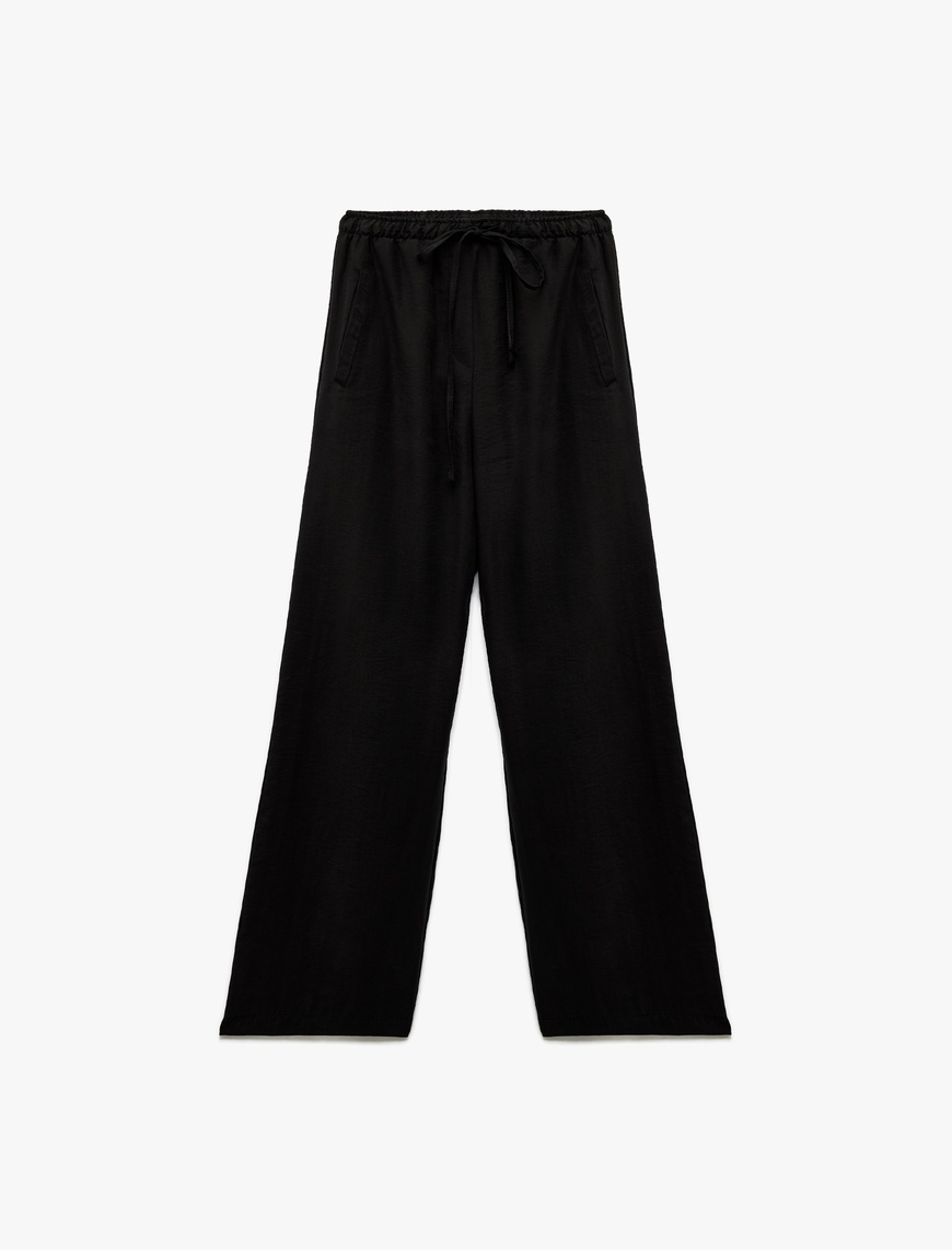   Beli Bağcıklı Bol Kalıp Cepli Geniş Paça Pantolon