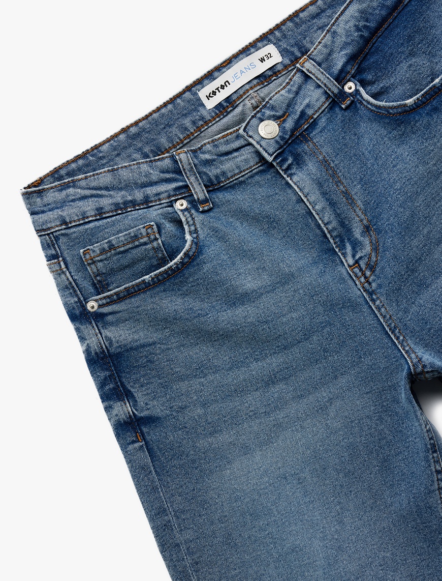   Katlamalı Paça Cep Detaylı Pamuklu Slim Fit Jean Şort
