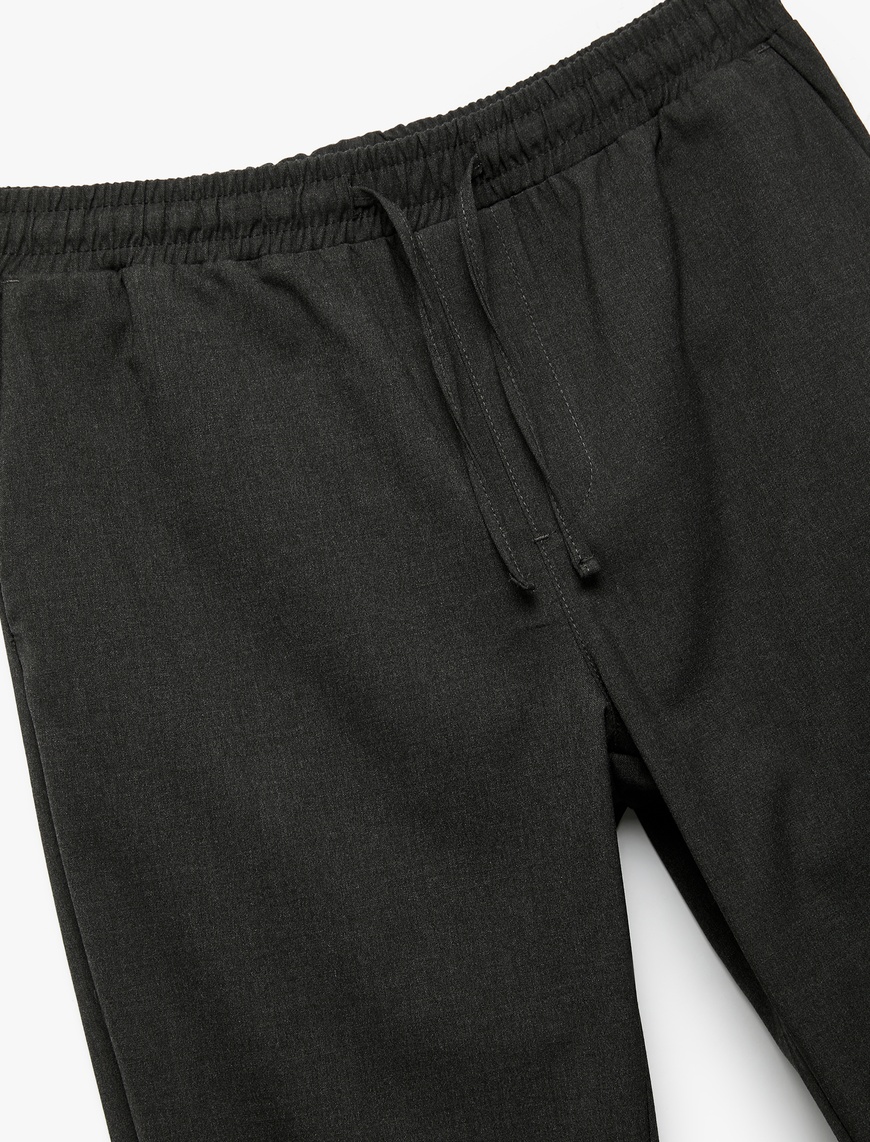   Beli Bağcıklı Katlamalı Paça Cep Detaylı Slim Fit Pantolon