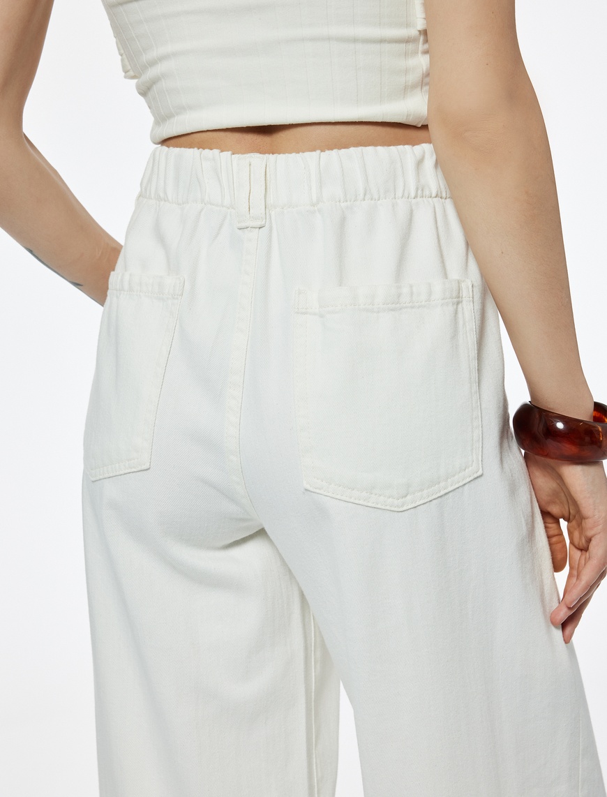   Koton X Şahika Ercümen - Pamuklu Loose Fit Bağcık Detaylı Geniş Paça Pantolon