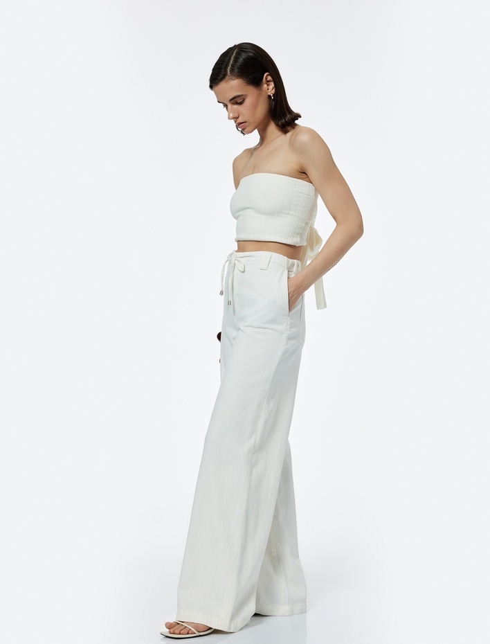  Koton X Şahika Ercümen - Pamuklu Loose Fit Bağcık Detaylı Geniş Paça Pantolon