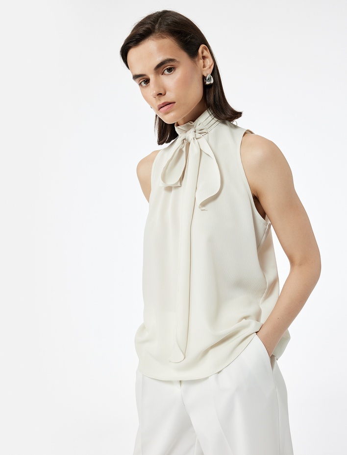  Bağlamalı Dik Yaka Kolsuz Bluz