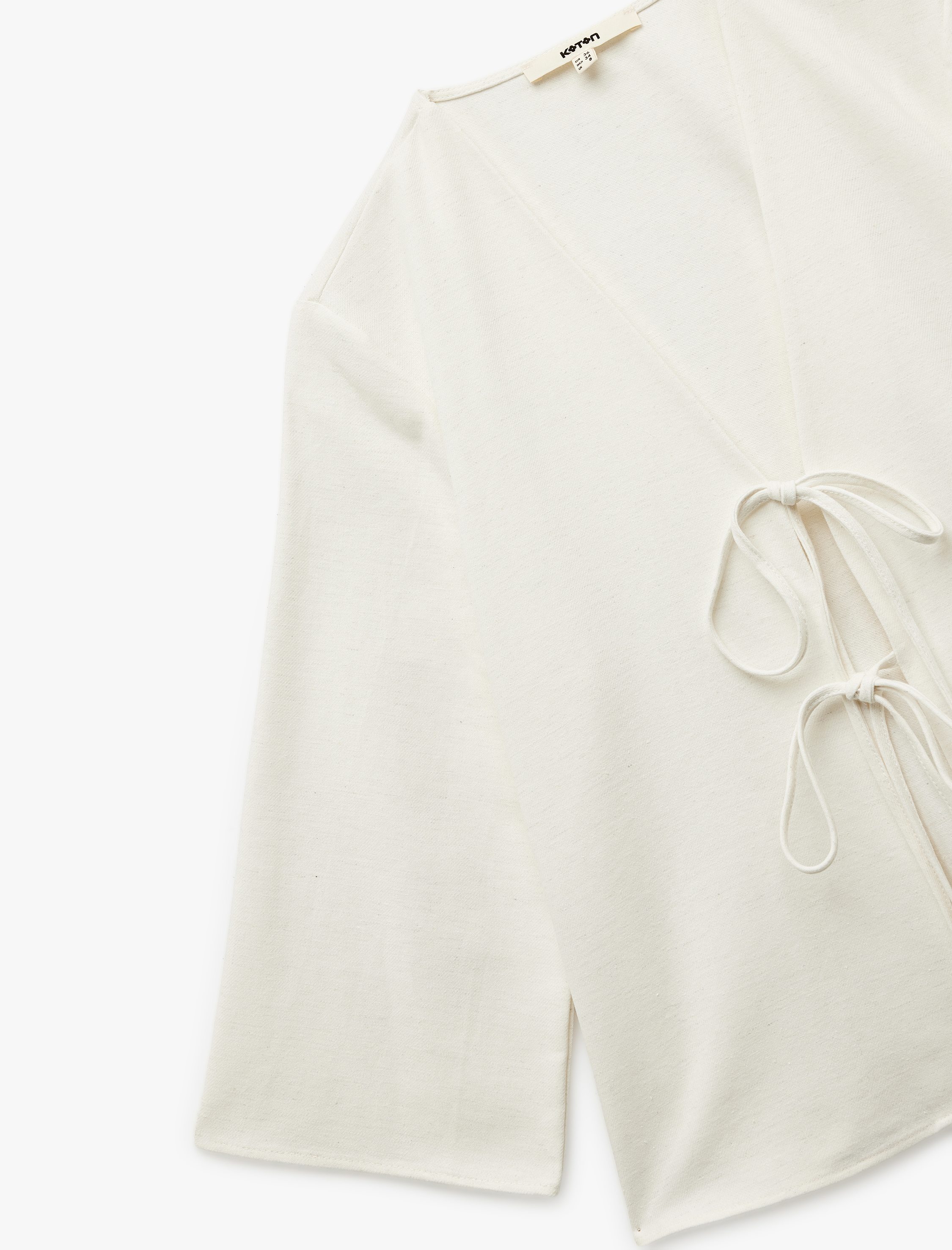   Keten Karışımlı Bol Kalıp Önden Bağlama Detaylı Fiyonklu 3/4 Kollu Bluz