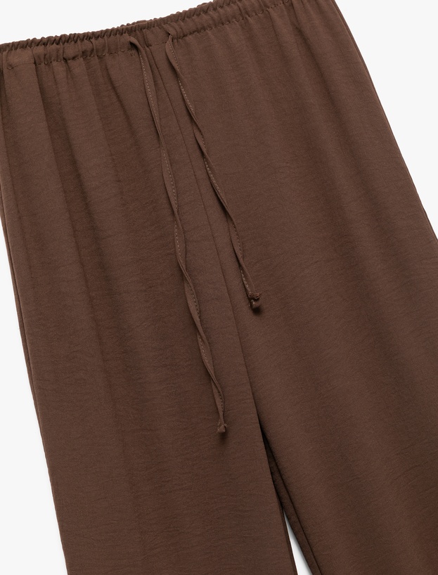 Aerobin Kumaş Geniş Paça Beli Bağcıklı Pantolon_4
