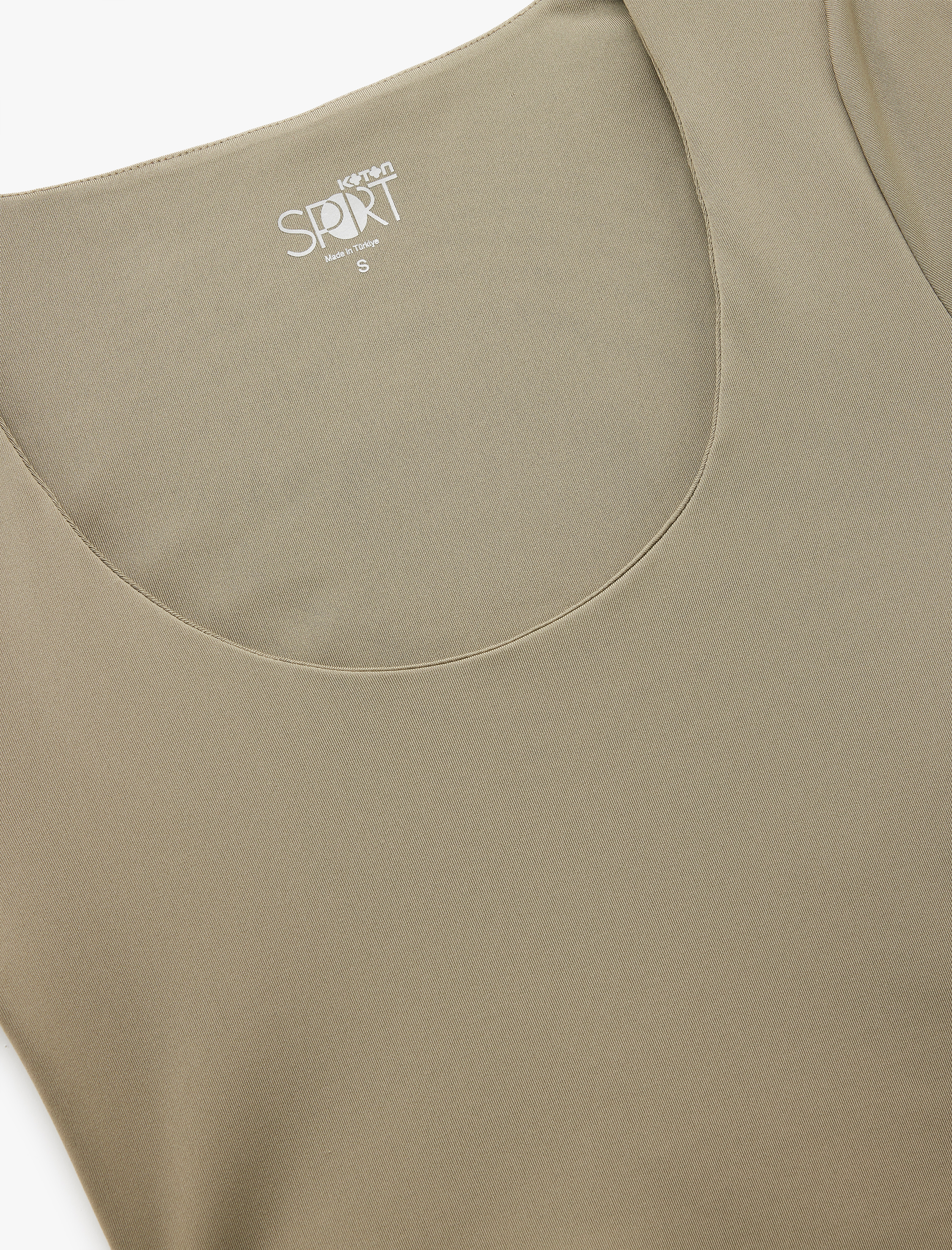   Bisiklet Yaka Kısa Kollu Asimetrik Crop Spor Tişört