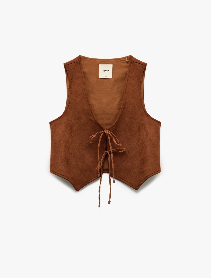   Slim Fit Önden Bağlama Detaylı Fiyonklu Suni Süet Crop Yelek
