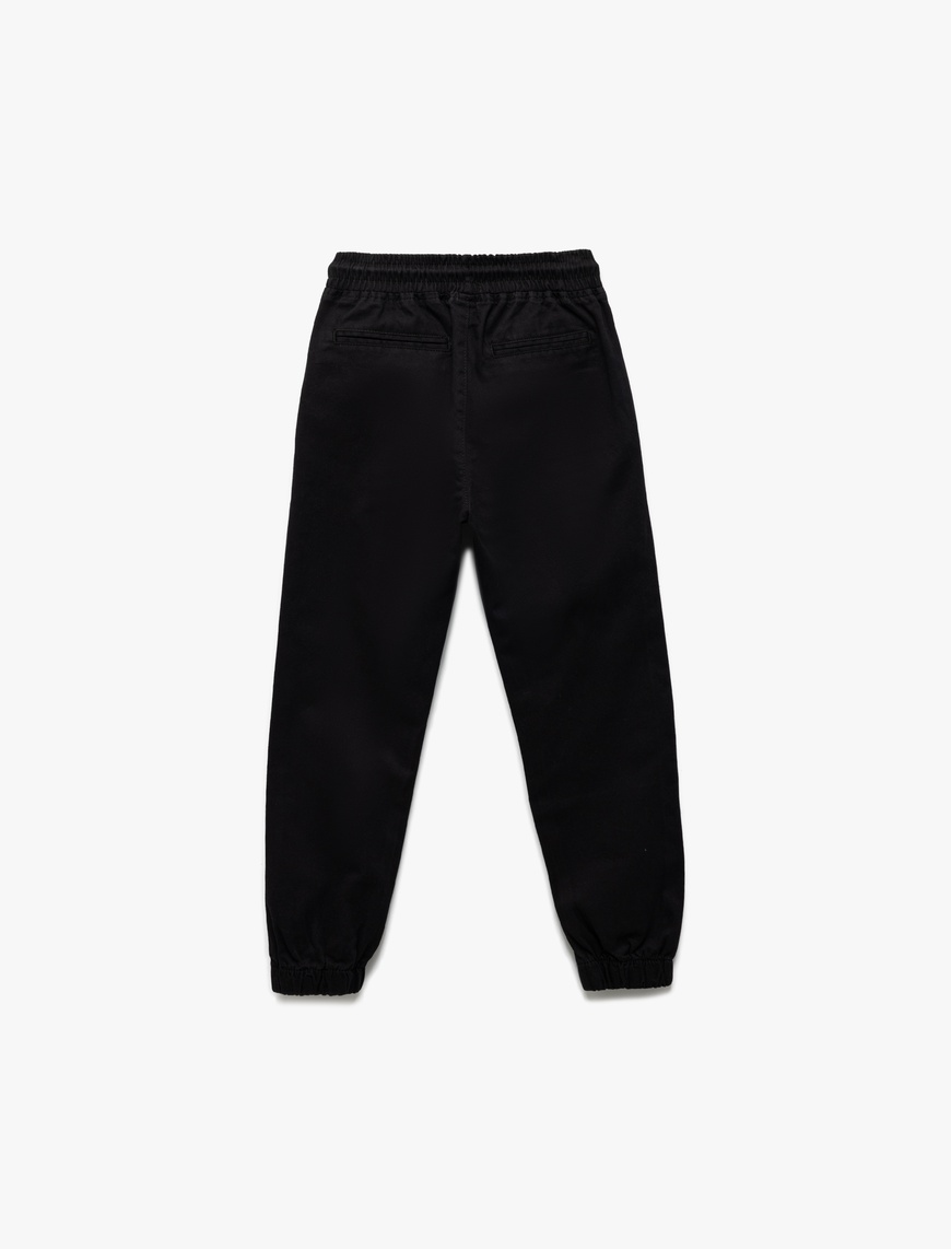  Erkek Çocuk Beli Bağcıklı Cep Detaylı Pamuklu Gabardin Jogger Okul Pantolonu