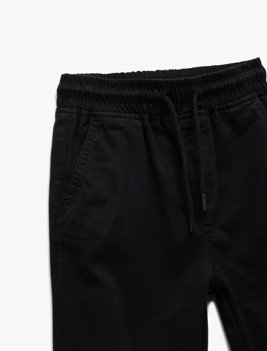  Erkek Çocuk Beli Bağcıklı Cep Detaylı Pamuklu Gabardin Jogger Okul Pantolonu