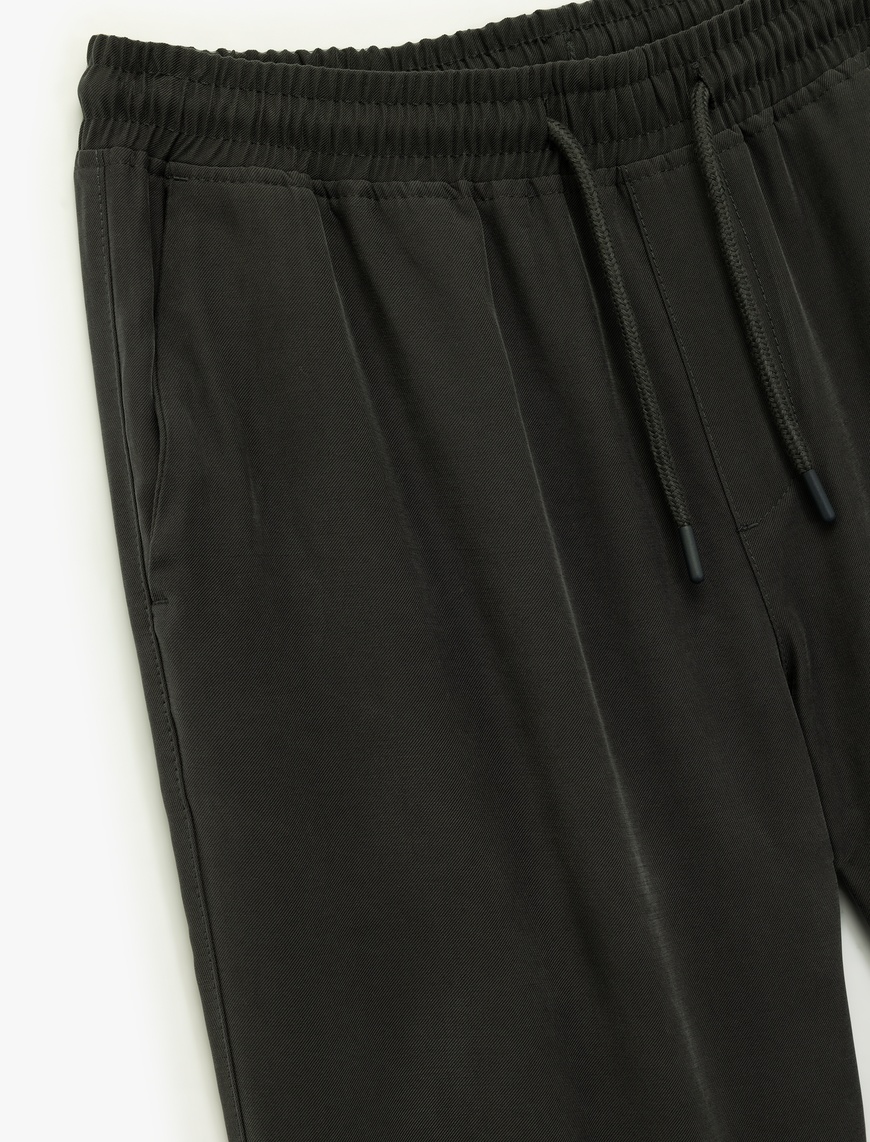  Viskon Cep Detaylı Rayon Tapered Beli Bağcıklı Yazlık Pantolon