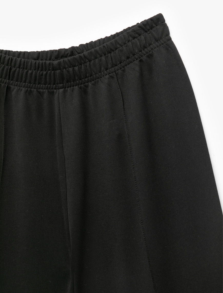  Kız Çocuk Pamuklu Beli Lastikli Geniş Paça Pantolon