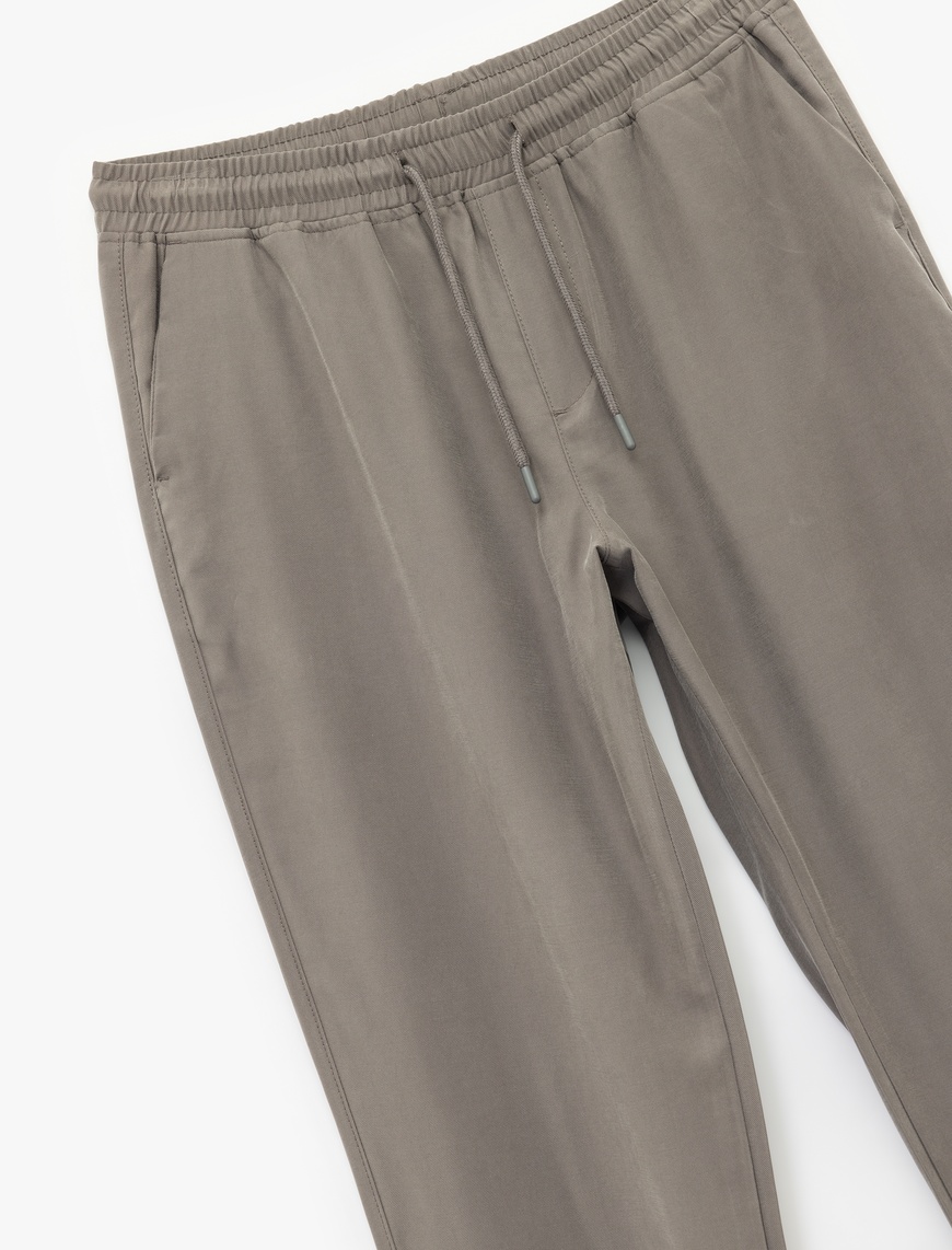   Viskon Cep Detaylı Rayon Tapered Beli Bağcıklı Yazlık Pantolon