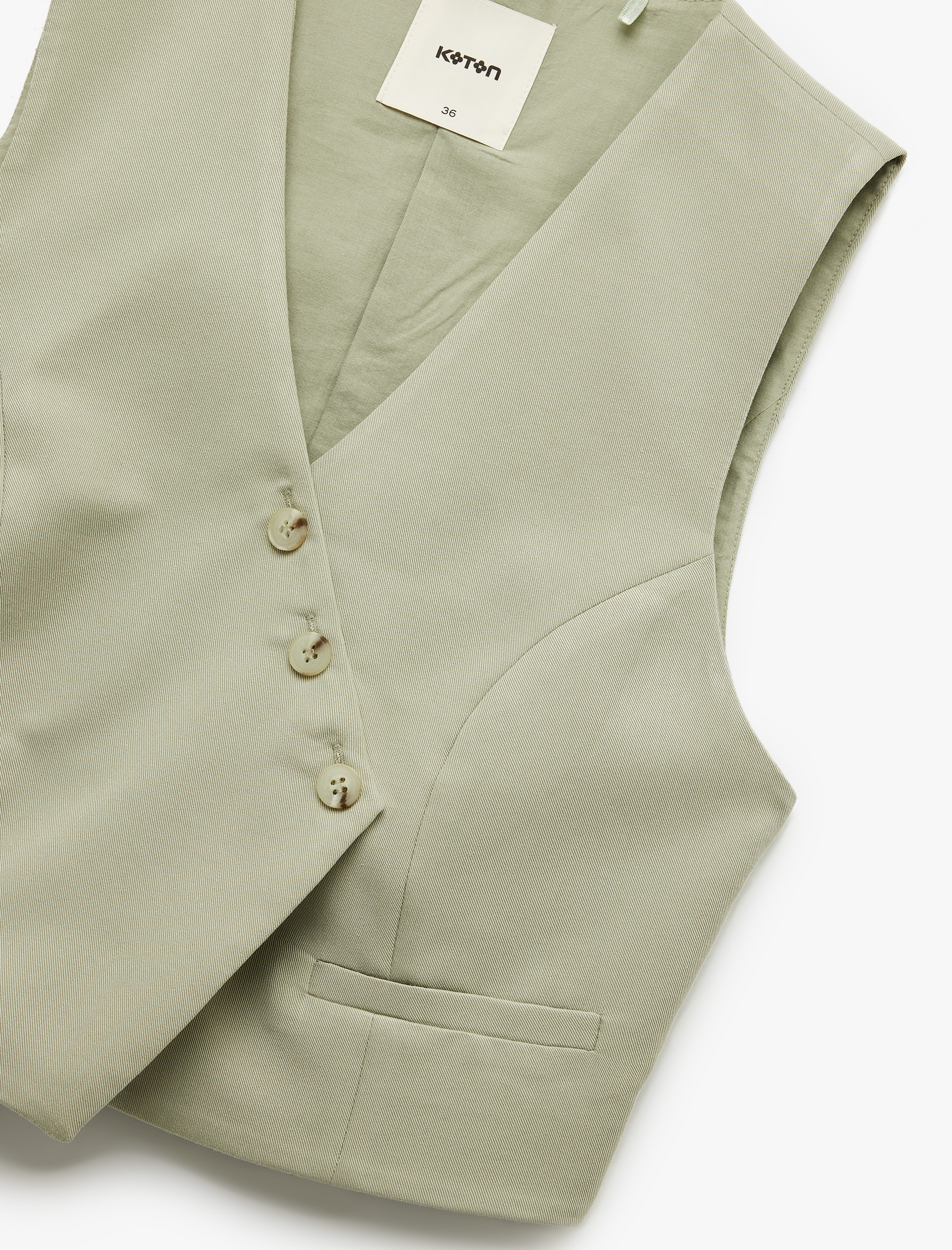   Modal Kumaş Asimetrik Kesim Düğmeli Kruvaze Crop Yelek