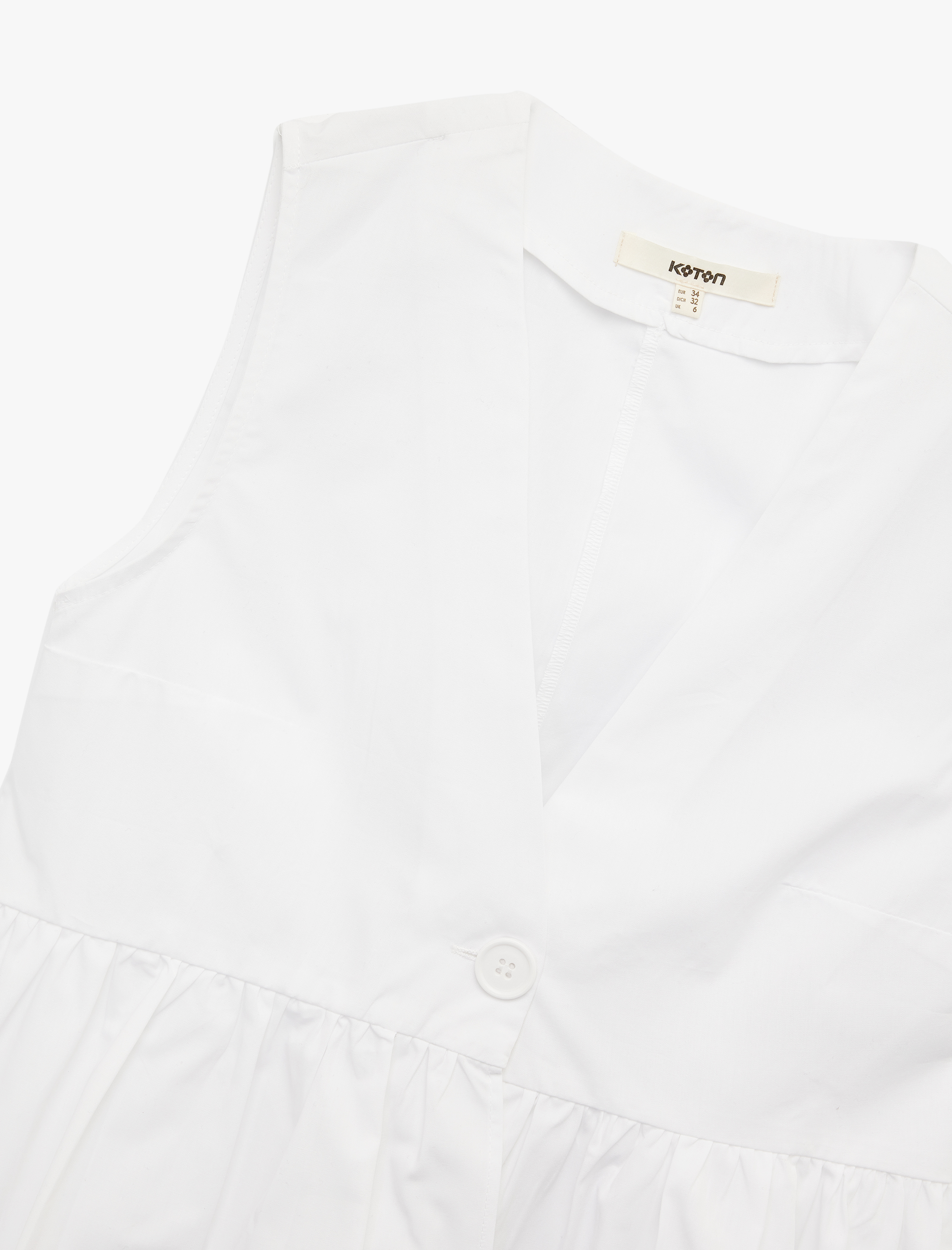 Pamuklu V Yaka Peplum Düğme Detaylı Kolsuz Poplin Bluz