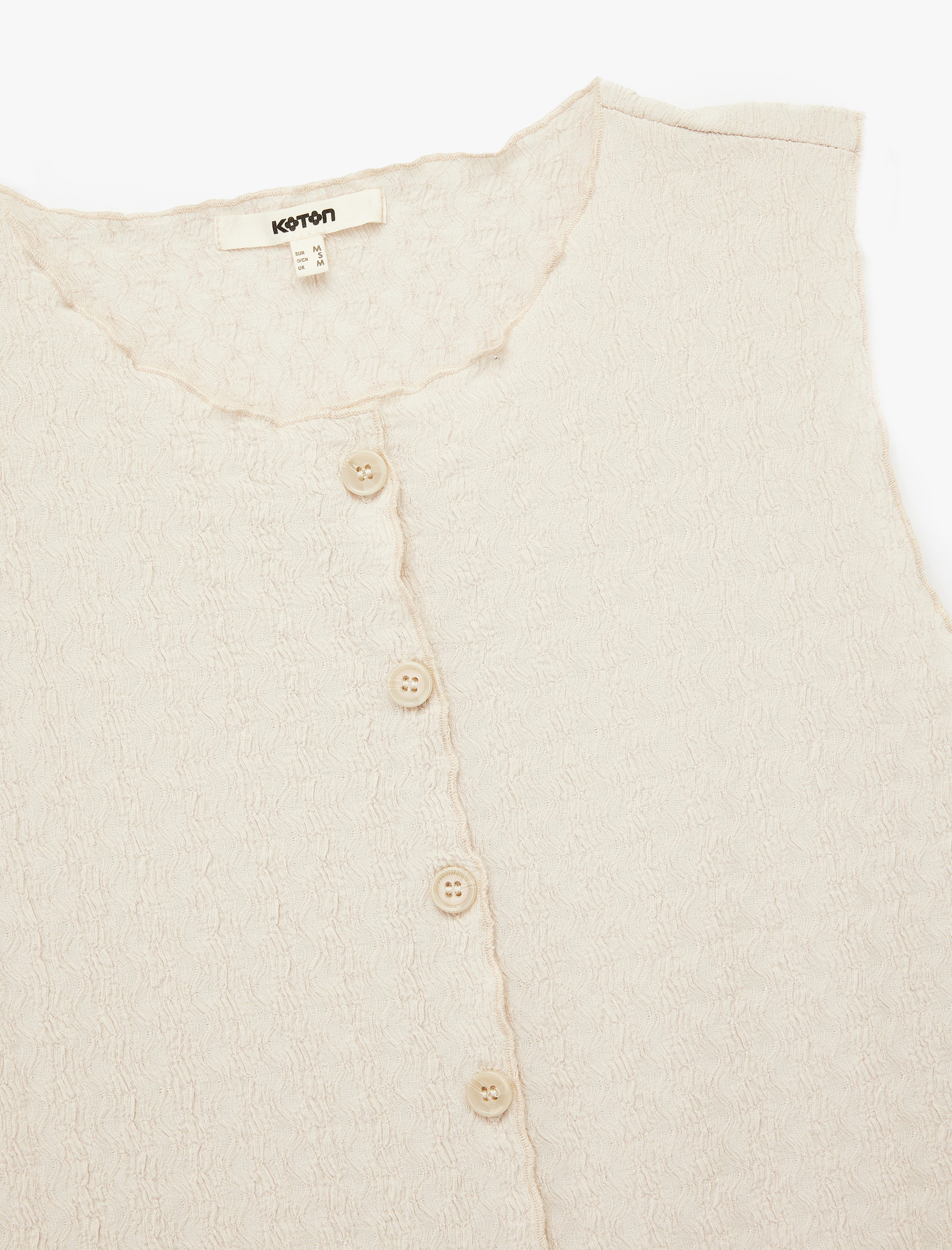   Bürümcük Kumaş Slim Fit Bisiklet Yaka Dokulu Kolsuz Düğmeli Bluz