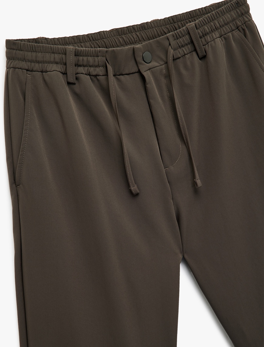   Beli Bağcıklı Düğmeli Duble Paça Esnek Slim Fit Pantolon