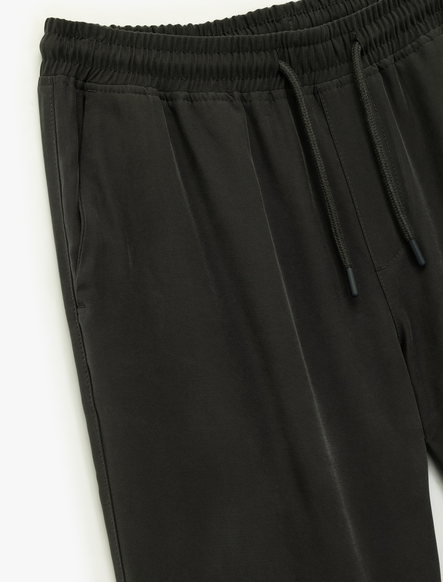   Viskon Cep Detaylı Rayon Tapered Beli Bağcıklı Yazlık Pantolon
