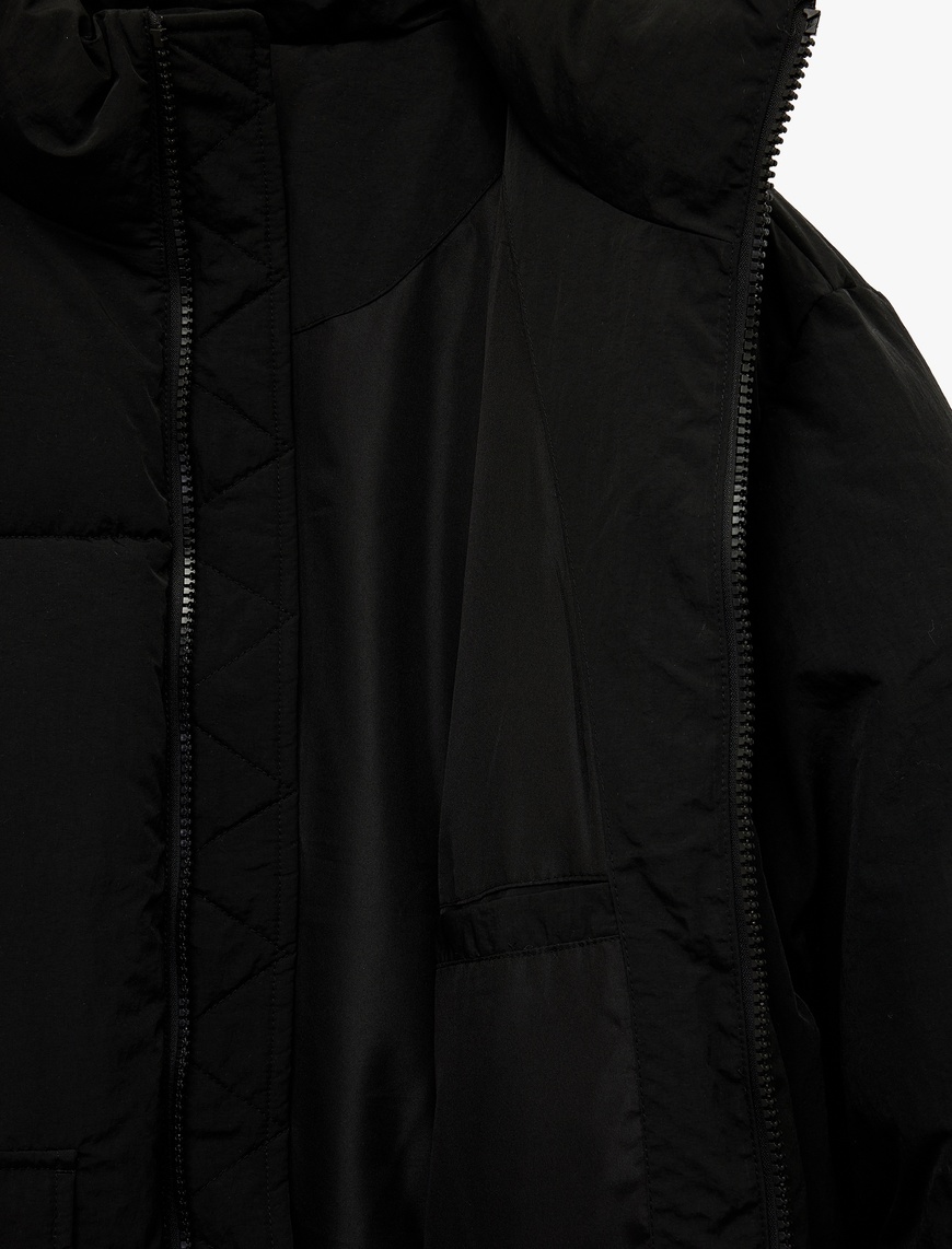   Uzun Kollu Kapaklı Cep Detaylı Fermuarlı Slim Fit Dik Yaka Şişme Mont
