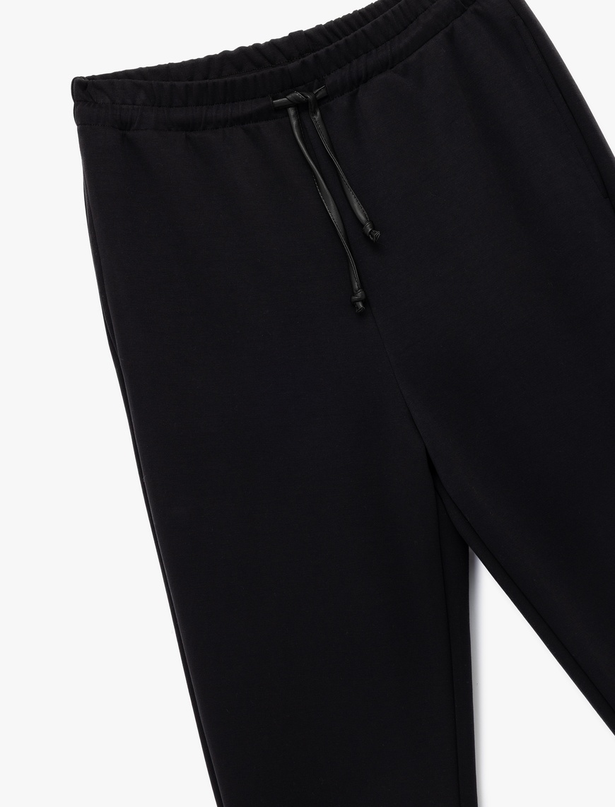   Modal Kumaş Cepli Beli Bağlamalı Jogger Pantolon