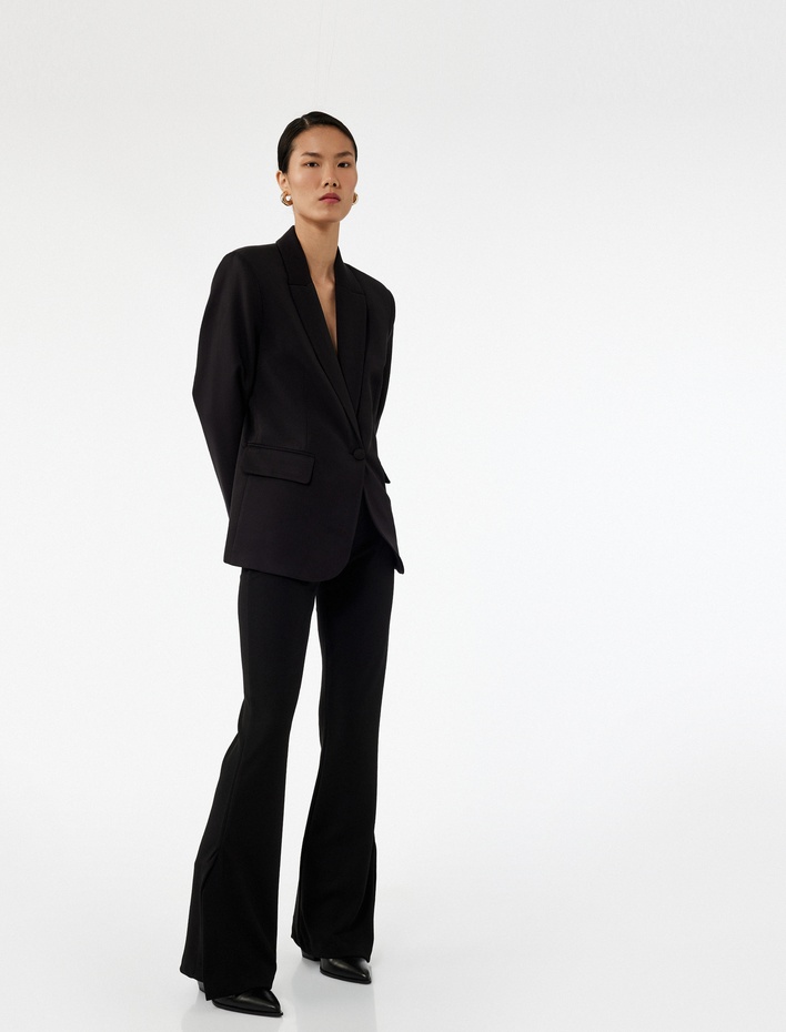  Slim Fit Yırtmaç Detaylı İspanyol Paça Pantolon
