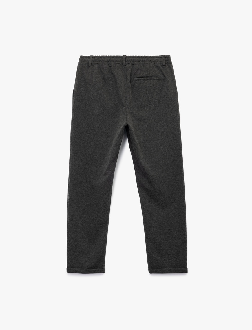   Beli Bağcıklı Düğmeli Pike Kumaş Cep Detaylı Duble Paça Slim Fit Pantolon