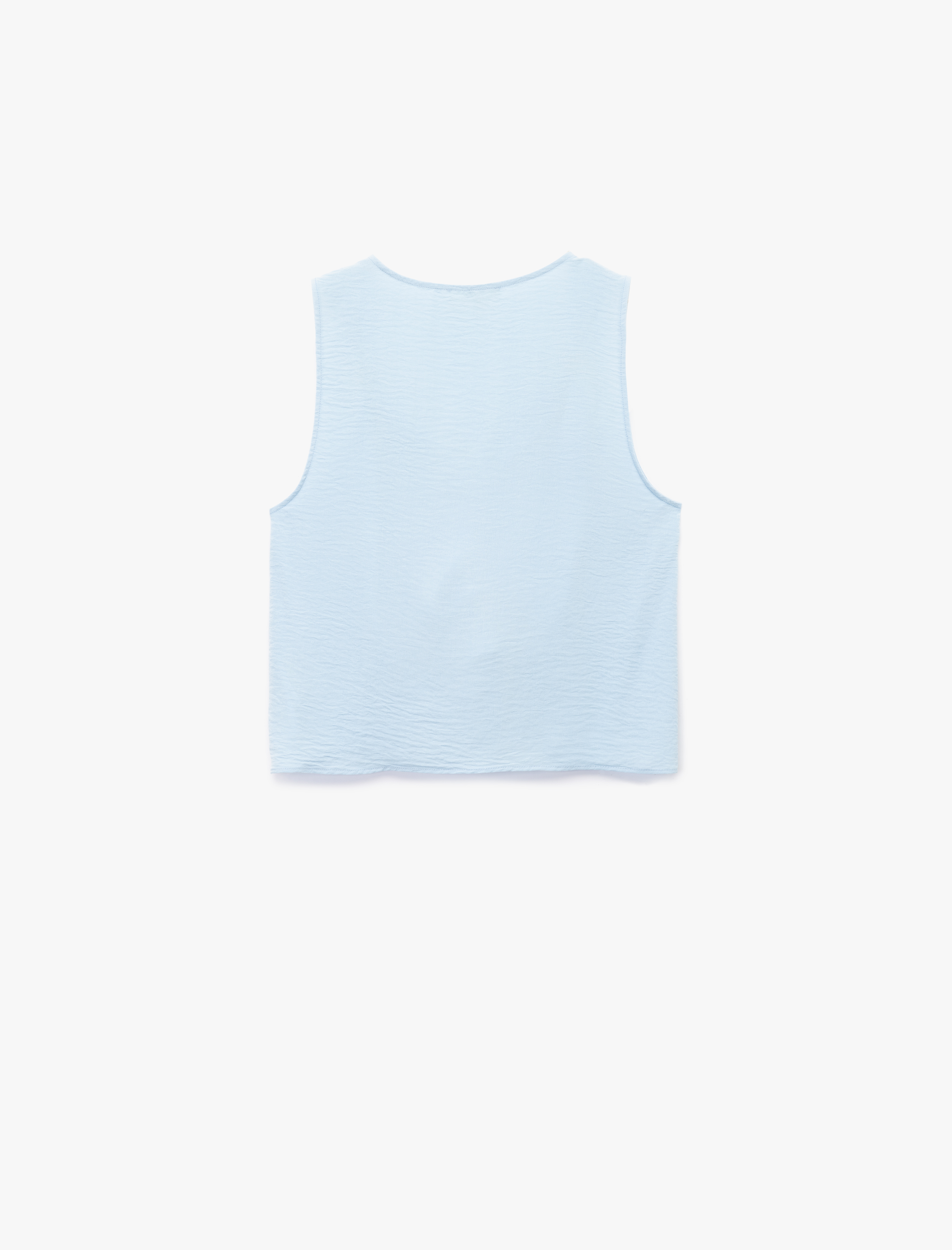   Aksesuar Detaylı V Yaka Kolsuz Bluz