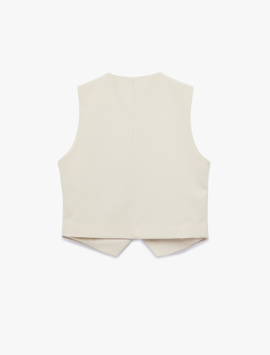   Viskon Karışımlı Slim Fit Bağlama Detaylı Crop Kruvaze Yaka Asimetrik Yelek