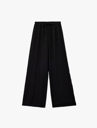 Beli Bağcıklı Rahat Kalıp Geniş Paça Keten Karışımlı Pantolon