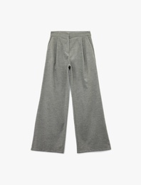 Cepli Piliseli Geniş Paça Kumaş Pantolon