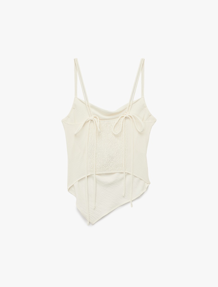  Arkası Gipeli Fiyonk Detaylı Asimetrik Kesim İnce Askılı Bluz