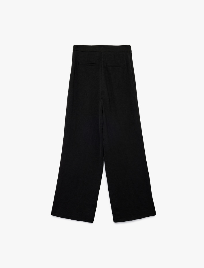  Aerobin Kumaş Asimetrik Kapak Detaylı Geniş Paça Pantolon