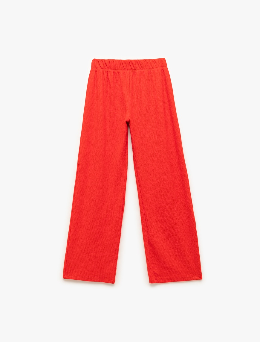   Beli Lastikli Dokulu Düz Bol Paça Pantolon