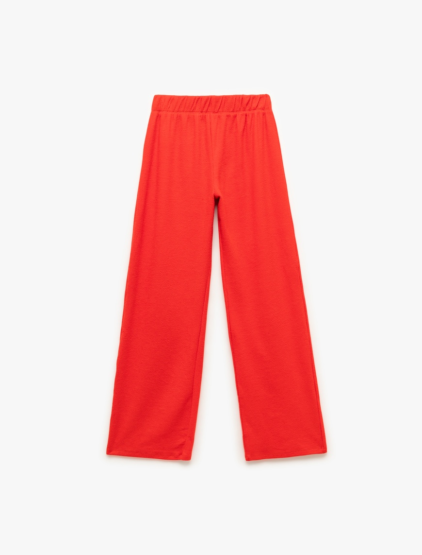   Beli Lastikli Dokulu Düz Bol Paça Pantolon