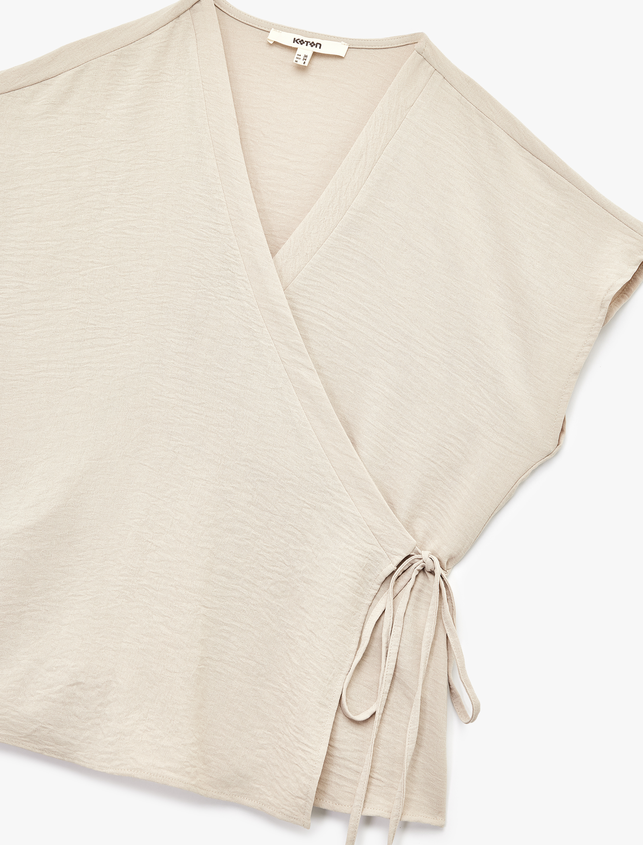   Aerobin Kumaş Bağlama Detaylı V Yaka Kruvaze Kolsuz Bluz