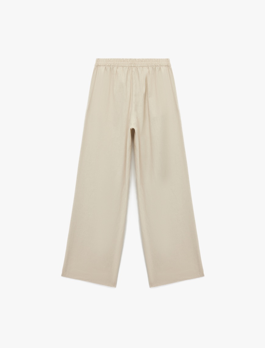   Beli Lastikli Düz Bol Paça Keten Pantolon