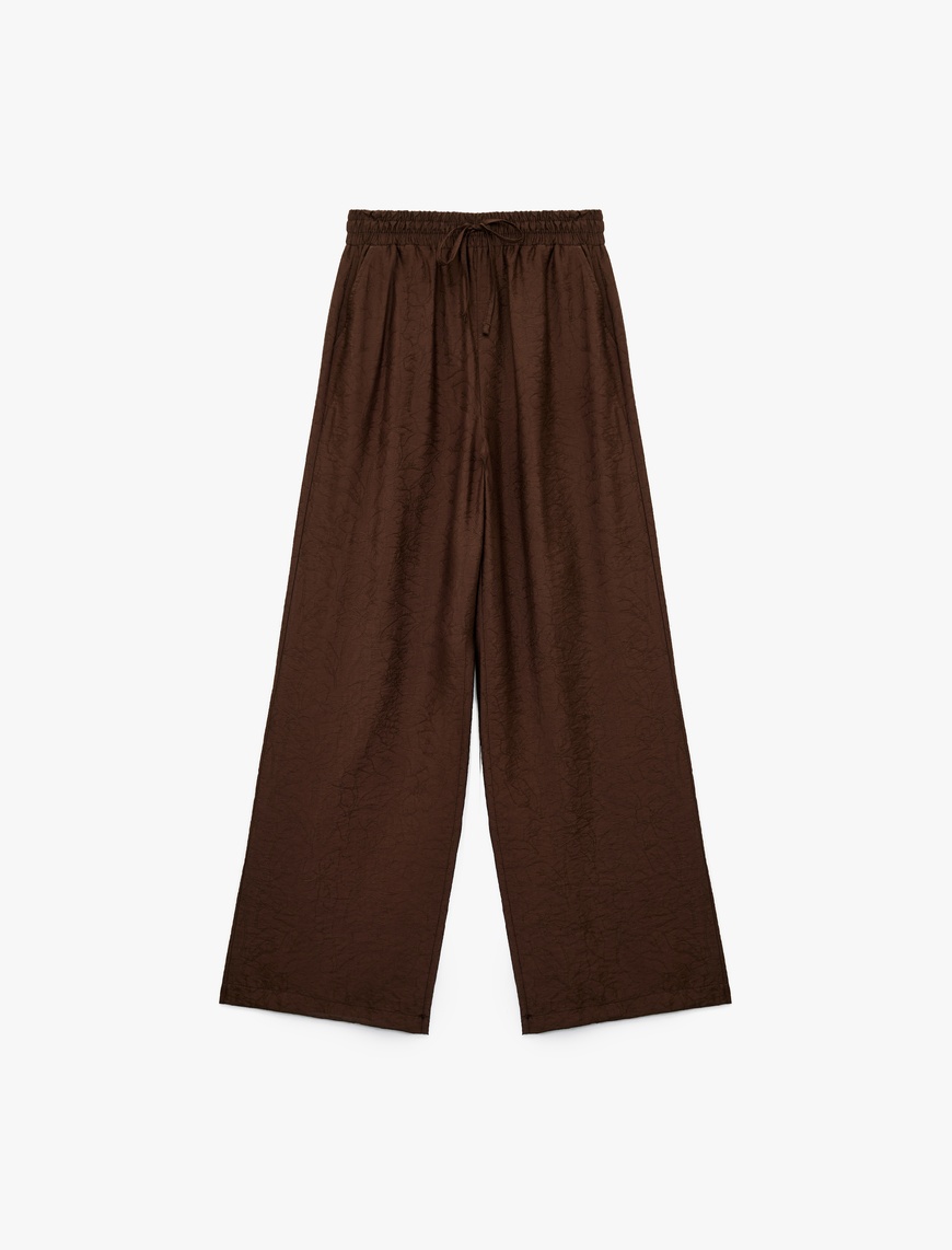  Modal Kumaş Cepli Beli Lastikli Bağlamalı Floral Dokulu Geniş Paça Pantolon