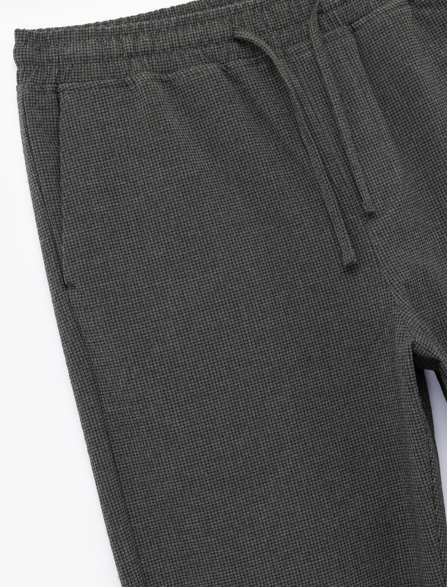   Viskon Karışımlı Cep Detaylı Dokulu Beli Bağcıklı Pantolon