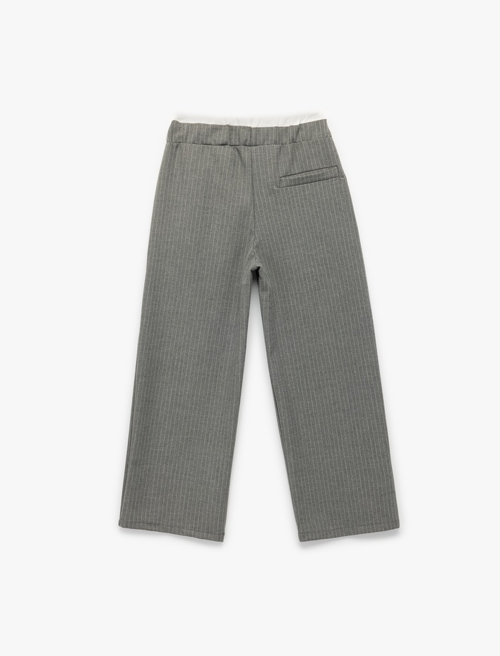 Kız Çocuk Beli Lastikli Fiyonklu Viskon Karışımlı Cep Detaylı Bol Kalıp Geniş Paça Pantolon