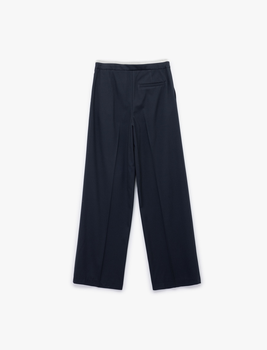  Ekstra Kumaş Detaylı Beli Bağlamalı Cepli Geniş Paça Baggy Pantolon