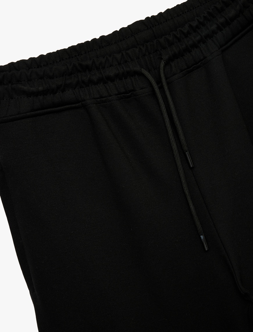   Rahat Kesim Fermuarlı Cep Detaylı Beli Bağcıklı Viskon Jogger Spor Eşofman Altı