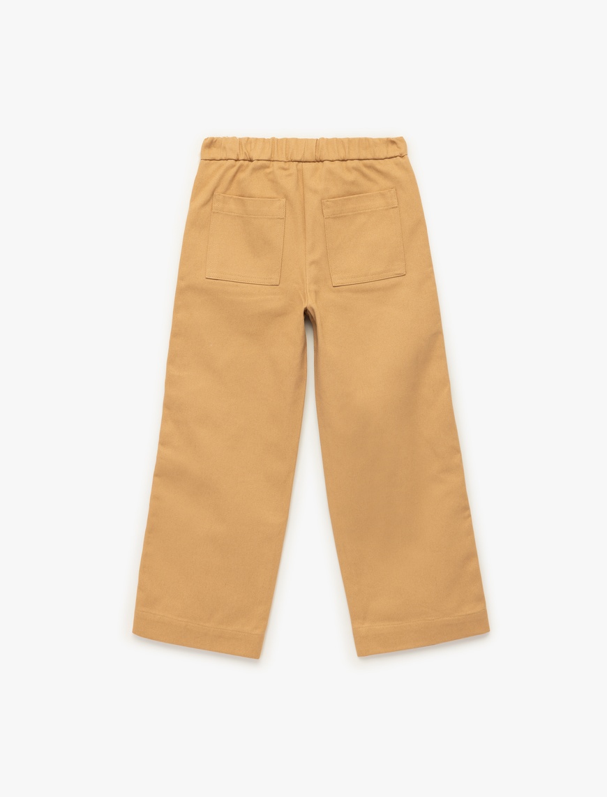  Kız Çocuk Pamuklu Rahat Kesim Yüksek Bel Beli Bağcıklı Şerit Detaylı Geniş Paça Pantolon