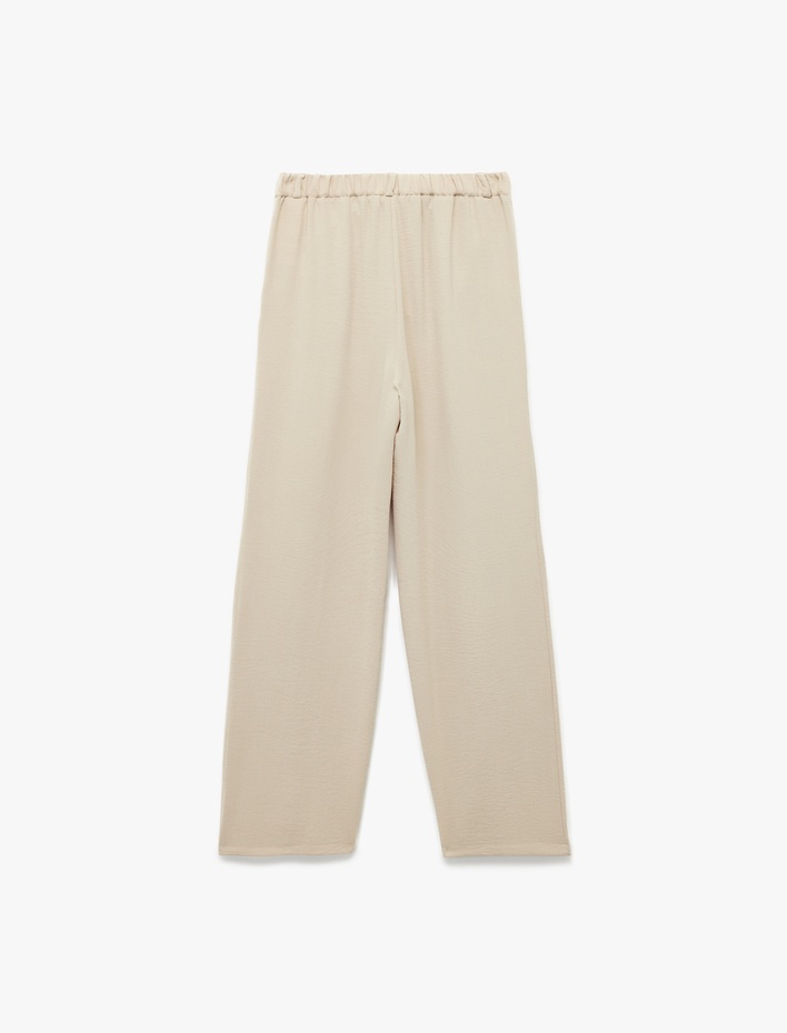  Aerobin Kumaş Pileli Cepli Düşük Bel Bol Paça Pantolon