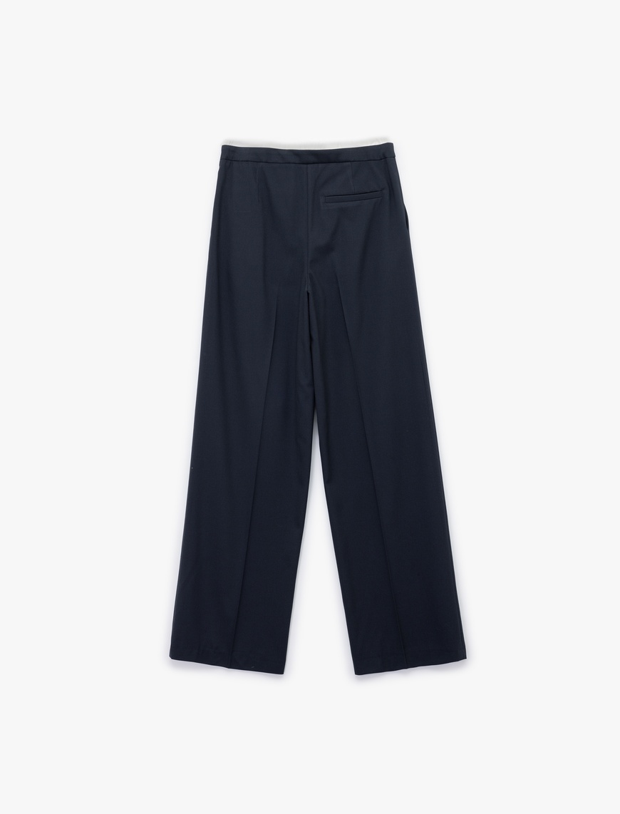   Ekstra Kumaş Detaylı Beli Bağlamalı Cepli Geniş Paça Baggy Pantolon