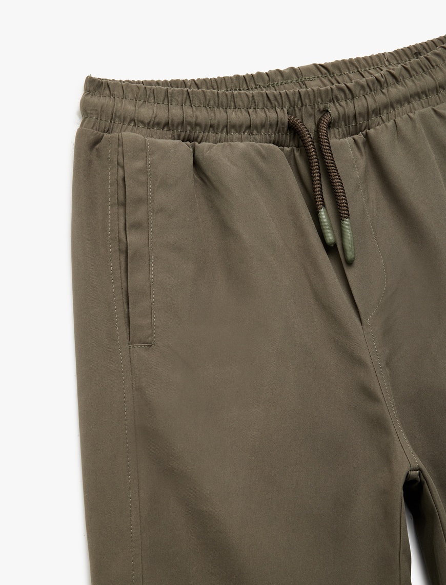  Erkek Çocuk Cepli Beli Lastikli Bağlamalı Loose Fit Jogger Paraşüt Pantolon